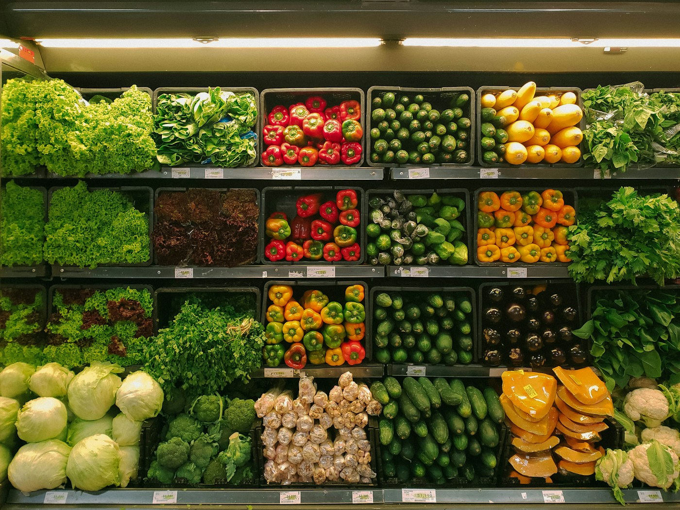 Colourful fresh vegetables and fruits at market display
